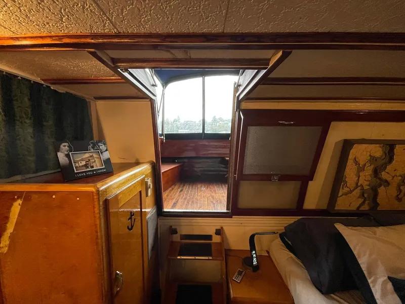 Slide: The Image of 1951 Chris-Craft Catalina interior with wood paneling and vintage decor. - 17