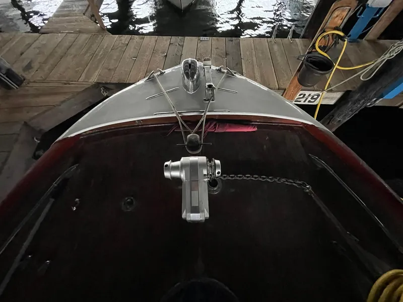 Slide: The Image of 1951 Chris-Craft Catalina boat docked, top view showing deck and mooring lines. - 25