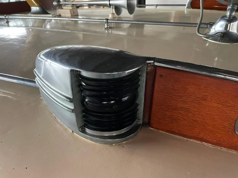 Slide: The Image of 1951 Chris-Craft Catalina boat detail with chrome and wood accents. - 28