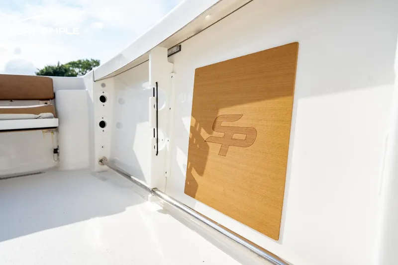 Slide: The Image of 2024 Sea Pro 239 Deep V CC boat interior with logo detail. - 14