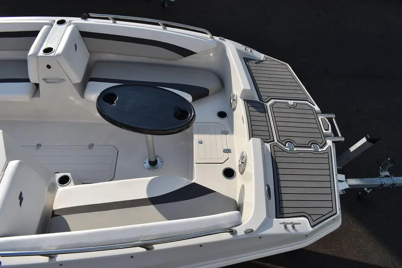 Slide: The Image of 2022 Starcraft SVX 171 boat interior with seating and table, featuring sleek design and modern amenities. - 16