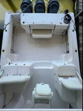 Slide: The Image of 2006 Grady-White Express 360 boat deck with seating and storage compartments. - 2