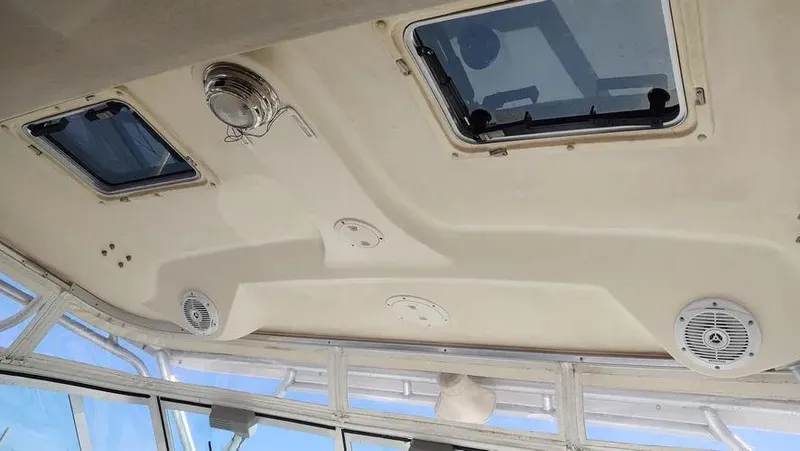Slide: The Image of Interior ceiling of 2006 Grady-White Express 360 boat with hatches and speakers. - 7