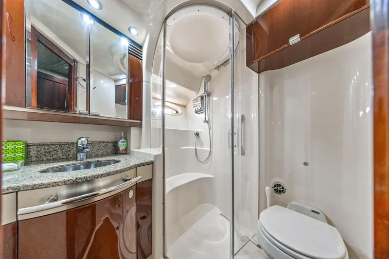 Slide: The Image of Luxurious bathroom in 2007 Sea Ray 52 Sedan Bridge yacht with modern fixtures. - 26