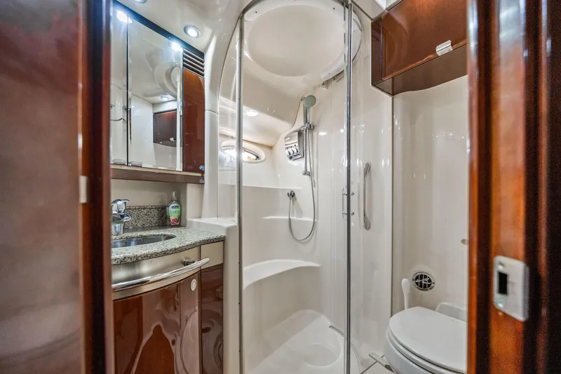 Slide: The Image of Luxurious bathroom in 2007 Sea Ray 52 Sedan Bridge yacht with shower and vanity. - 27