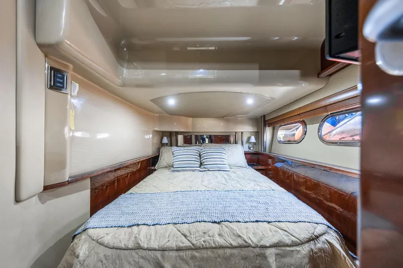 Slide: The Image of Luxurious bedroom interior of 2007 Sea Ray 52 Sedan Bridge yacht. - 33