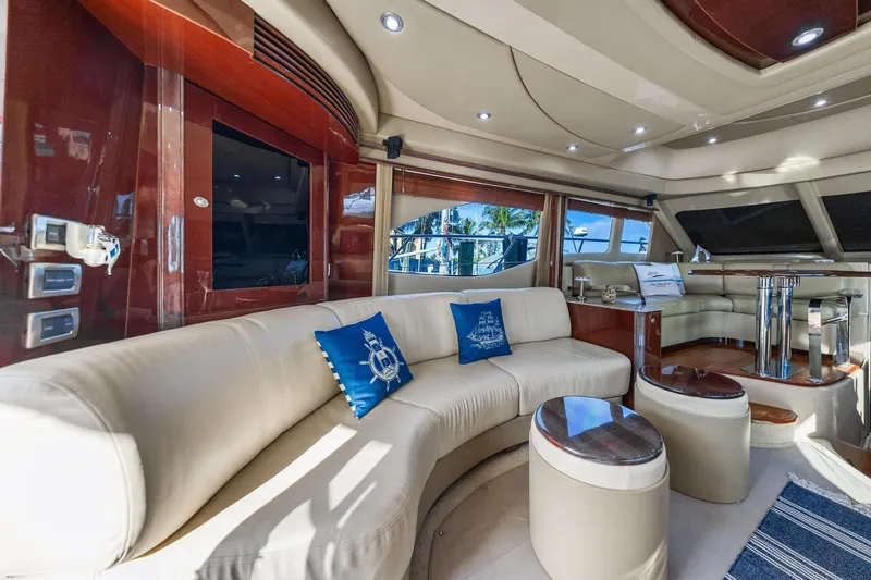 Slide: The Image of Luxurious interior of 2007 Sea Ray 52 Sedan Bridge yacht with elegant seating and decor. - 38