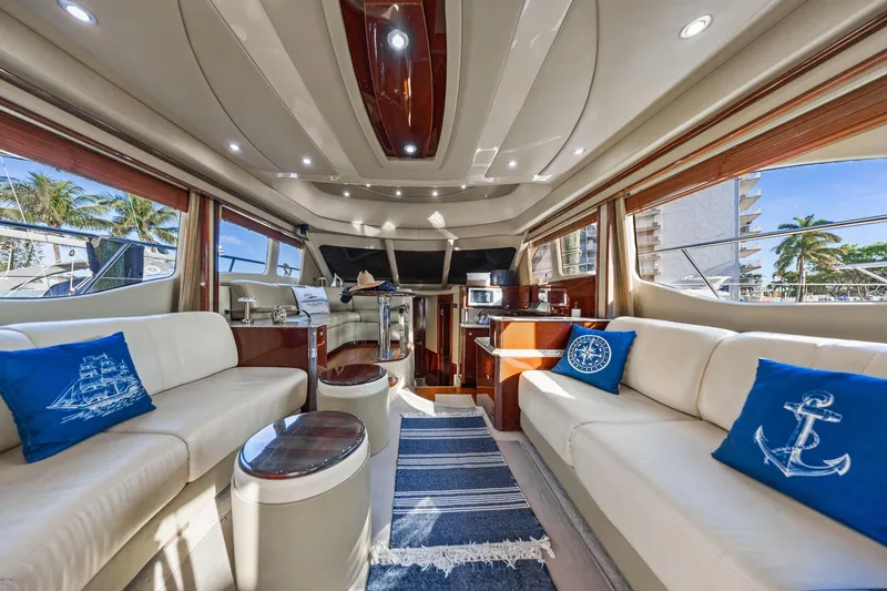 Slide: The Image of Luxurious interior of 2007 Sea Ray 52 Sedan Bridge yacht with elegant seating and nautical decor. - 41