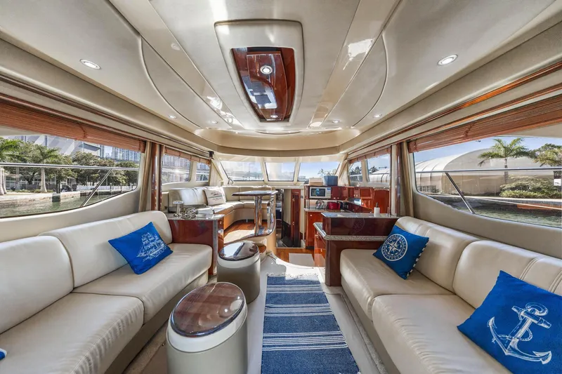 Slide: The Image of Luxurious interior of 2007 Sea Ray 52 Sedan Bridge yacht with elegant seating and decor. - 44