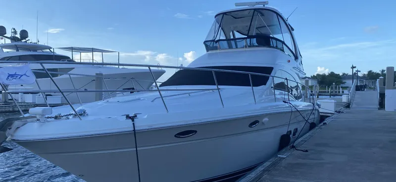 Slide: The Image of 2007 Sea Ray 52 Sedan Bridge yacht docked at marina. - 9