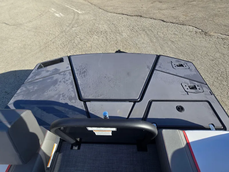 Slide: The Image of 2025 Manitou 240 Cruise boat deck with sleek design and modern features. - 2