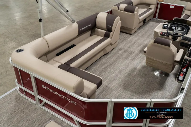 Slide: The Image of 2025 Bennington 21 SLSE pontoon boat interior with beige and brown seating. - 11