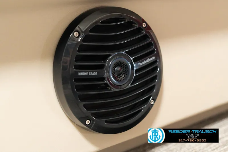Slide: The Image of Marine-grade speaker on 2025 Bennington 21 SLSE boat, Reeder-Trausch logo visible. - 35