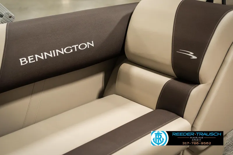 Slide: The Image of 2025 Bennington 21 SLSE boat interior with branded seating and logo. - 37