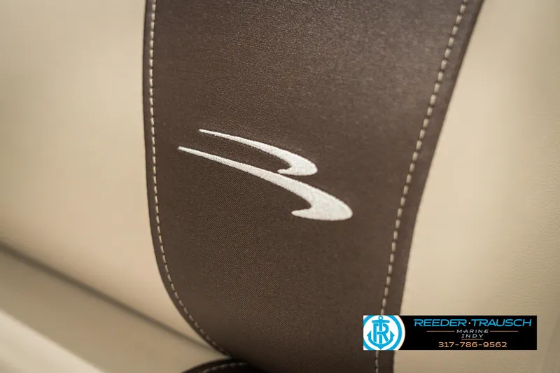 Slide: The Image of Bennington 21 SLSE 2025 boat seat with logo detail. - 39
