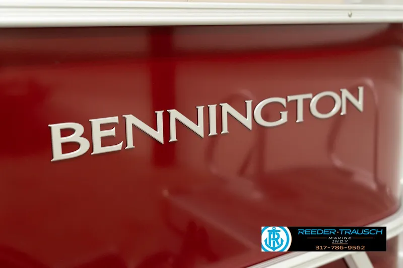 Slide: The Image of 2025 Bennington 21 SLSE boat, red exterior with brand logo. - 44