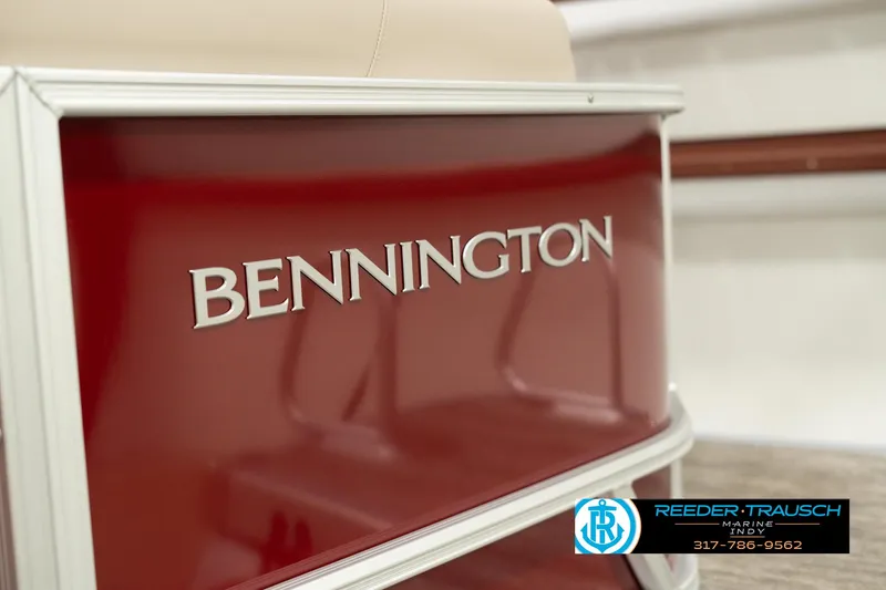 Slide: The Image of 2025 Bennington 21 SLSE pontoon boat, red exterior, close-up view. - 45