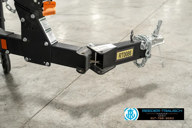 Slide: The Image of Trailer hitch of 2025 Lund 1775 Impact XS boat, displayed indoors. - 49