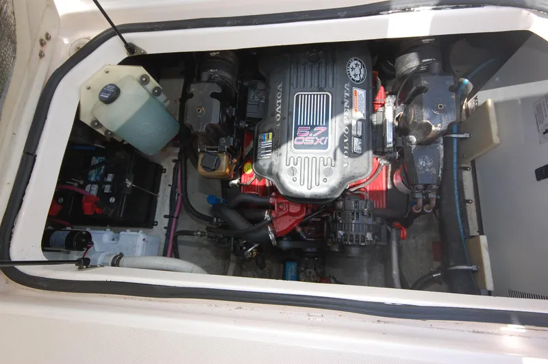 Slide: The Image of 2007 Regal 2665 Commodore engine compartment with visible components and wiring. - 16