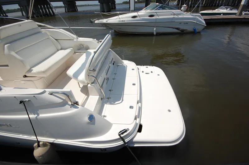 Slide: The Image of 2007 Regal 2665 Commodore boat docked in marina, rear view. - 3