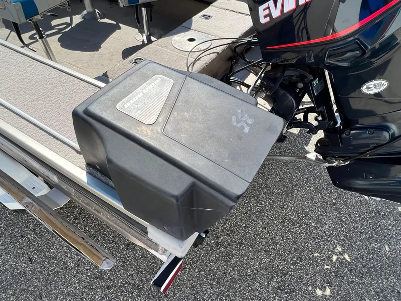 Slide: The Image of 2001 Alumacraft Trophy 175 boat with Evinrude motor, rear view on trailer. - 11