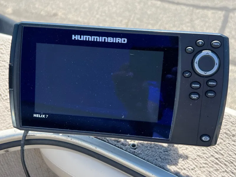 Slide: The Image of Humminbird Helix 7 fish finder on 2001 Alumacraft Trophy 175 boat. - 17