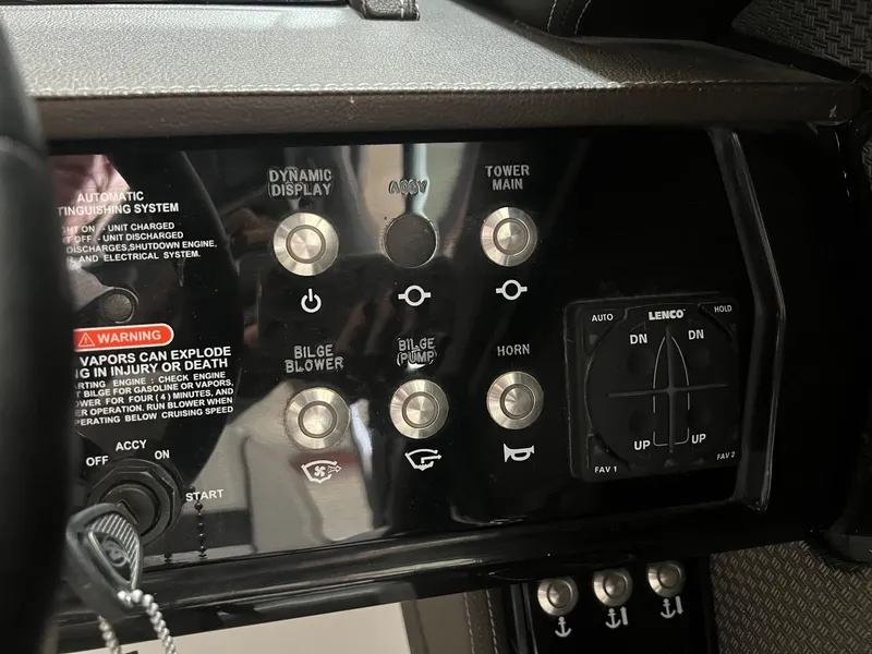 Slide: The Image of Control panel of a 2018 Sea Ray 280 SLX boat with various switches and warnings. - 21
