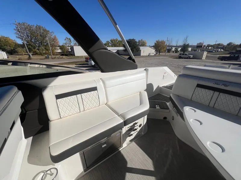 Slide: The Image of 2018 Sea Ray 280 SLX boat interior with white seating and modern design. - 33