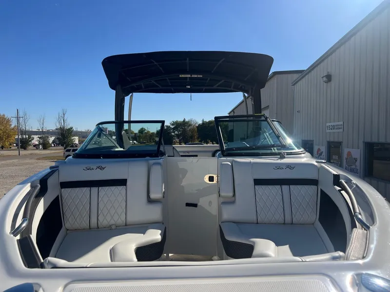 Slide: The Image of 2018 Sea Ray 280 SLX boat with open seating and sleek design. - 4