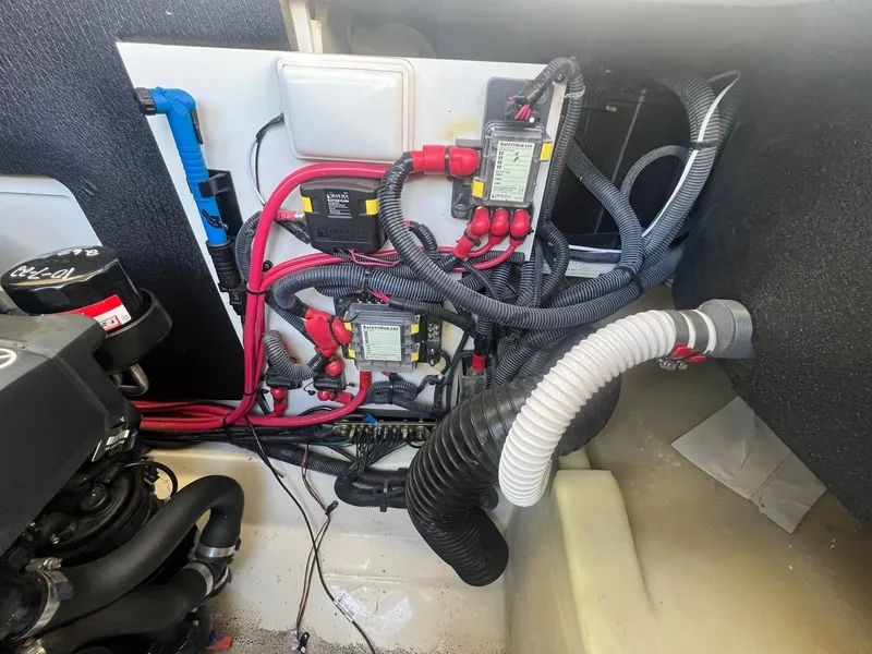 Slide: The Image of Engine compartment of 2018 Sea Ray 280 SLX with wiring and components. - 42
