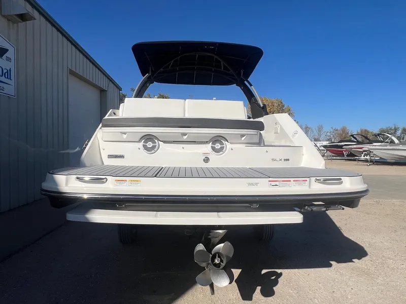 Slide: The Image of 2018 Sea Ray 280 SLX boat rear view with swim platform and propeller. - 6