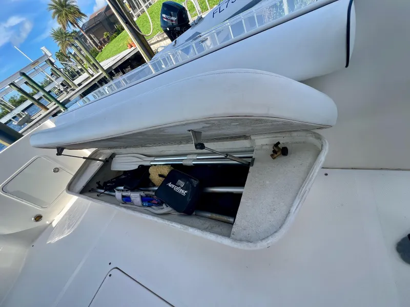 Slide: The Image of Open storage compartment on 2007 Sea Ray 52 Sedan Bridge yacht deck. - 16