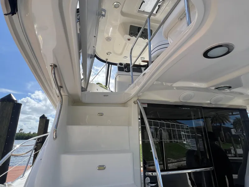 Slide: The Image of 2007 Sea Ray 52 Sedan Bridge yacht interior with stairs and railing. - 20