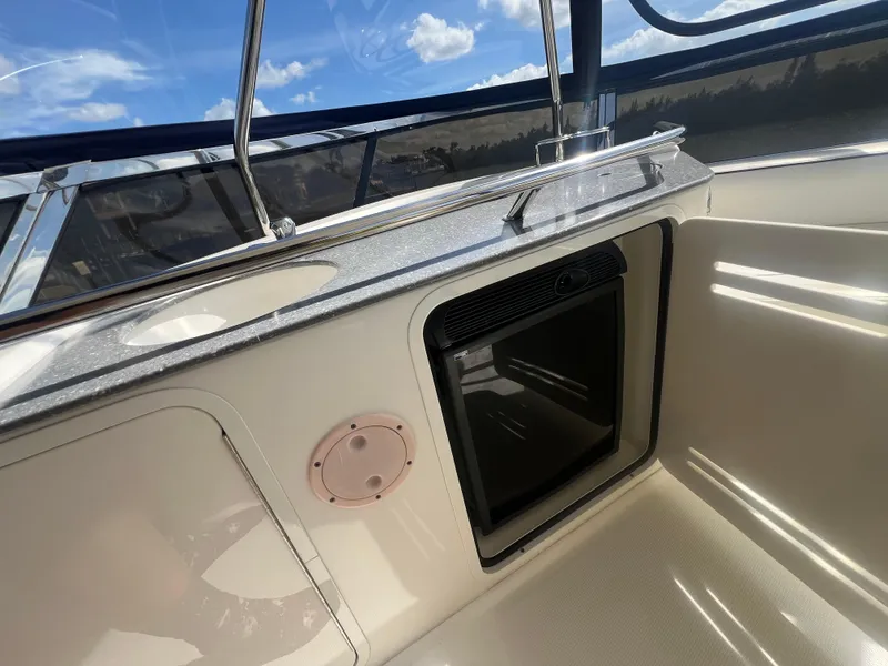Slide: The Image of 2007 Sea Ray 52 Sedan Bridge interior with sleek design and modern amenities. - 29