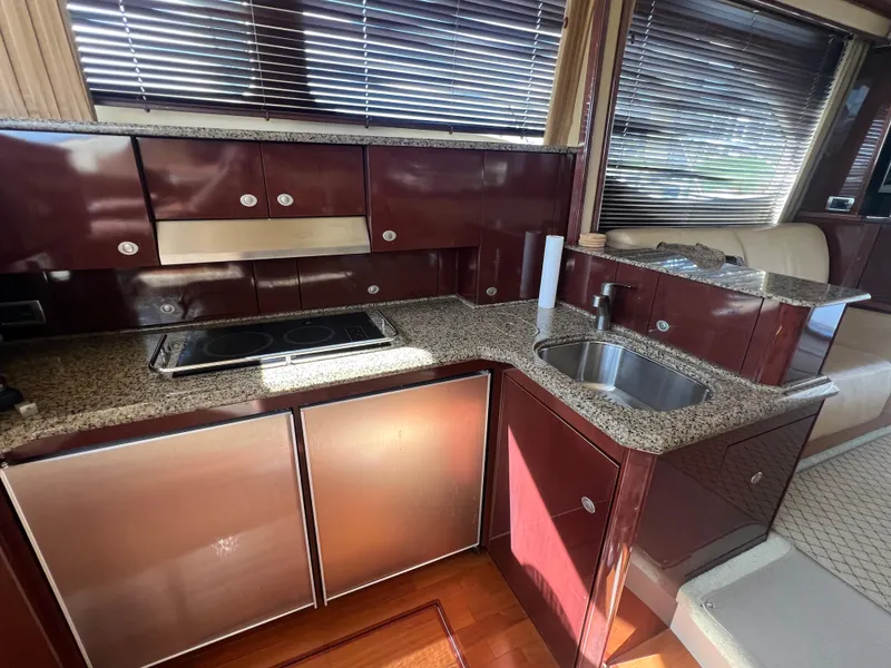 Slide: The Image of Luxurious kitchen interior of 2007 Sea Ray 52 Sedan Bridge yacht. - 39
