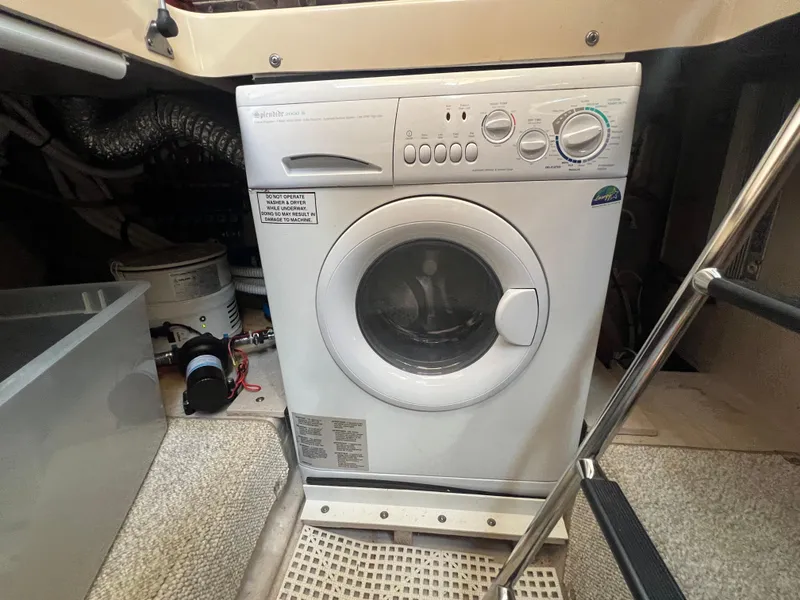 Slide: The Image of Washing machine in 2007 Sea Ray 52 Sedan Bridge yacht interior. - 42
