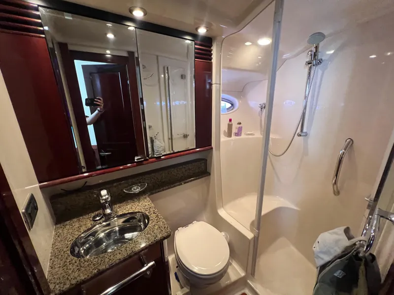 Slide: The Image of Luxurious bathroom in 2007 Sea Ray 52 Sedan Bridge yacht with modern fixtures. - 48