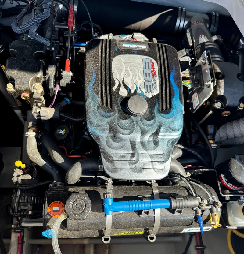 Slide: The Image of Engine of a 2005 Chris-Craft Corsair 28 boat, featuring detailed components and design. - 25