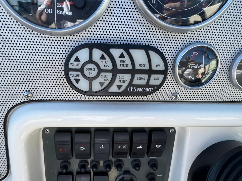 Slide: The Image of Dashboard controls of a 2005 Chris-Craft Corsair 28 boat. - 9
