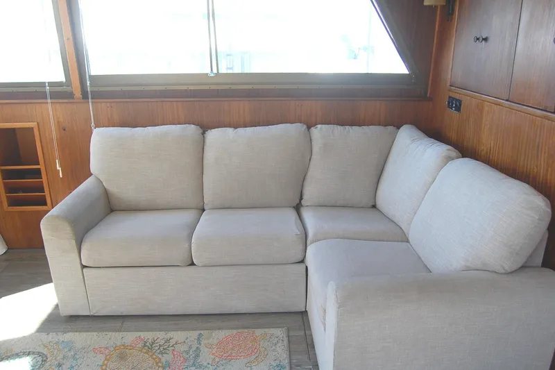 Slide: The Image of Beige sectional sofa in 1981 Hatteras 48 Cockpit MY yacht interior. - 10