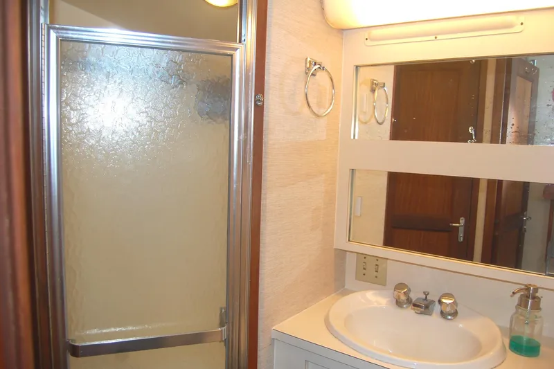 Slide: The Image of Bathroom interior of 1981 Hatteras 48 Cockpit MY with shower and sink. - 28