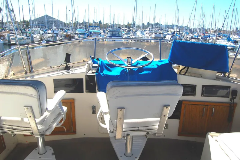 Slide: The Image of Cockpit view of 1981 Hatteras 48 Cockpit MY yacht in marina. - 37