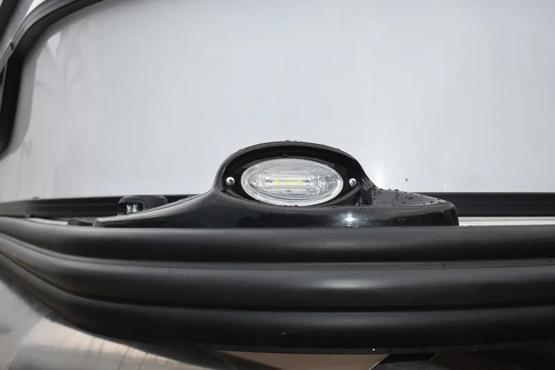 Slide: The Image of Close-up of 2023 Lowe SF212 Walk-Through boat's LED light detail. - 12