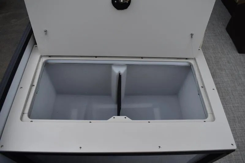 Slide: The Image of 2023 Lowe SF212 Walk-Through boat storage compartment, open lid, spacious interior. - 21