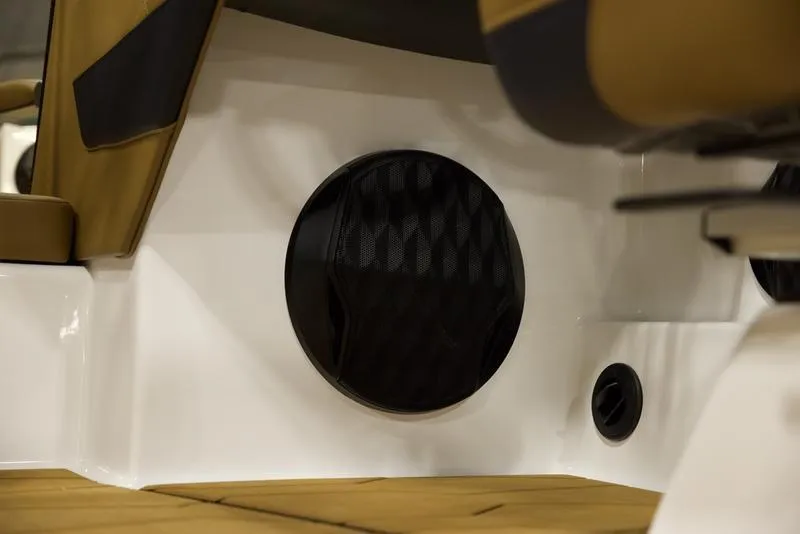 Slide: The Image of 2025 Malibu 22 MXZ boat interior with speaker detail. - 15