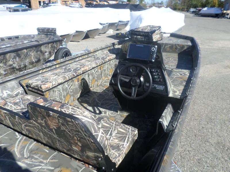 Slide: The Image of 2025 War Eagle 754 DSV boat with camouflage interior and advanced navigation system. - 6