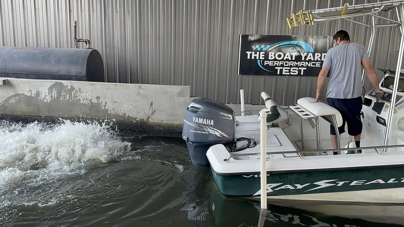 Slide: The Image of 2001 Bay Stealth VIP 2230 boat undergoing performance test at The Boat Yard. - 17