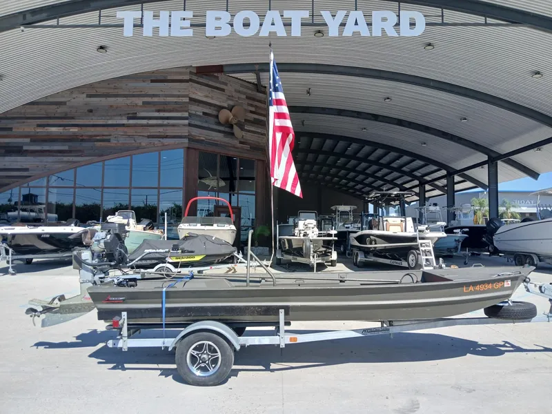 Slide: The Image of 2023 Go-Devil 18x48 boat on trailer at The Boat Yard dealership. - 2