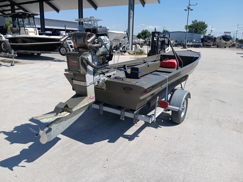 Slide: The Image of 2023 Go-Devil 18x48 boat on trailer, outdoor dealership display. - 3