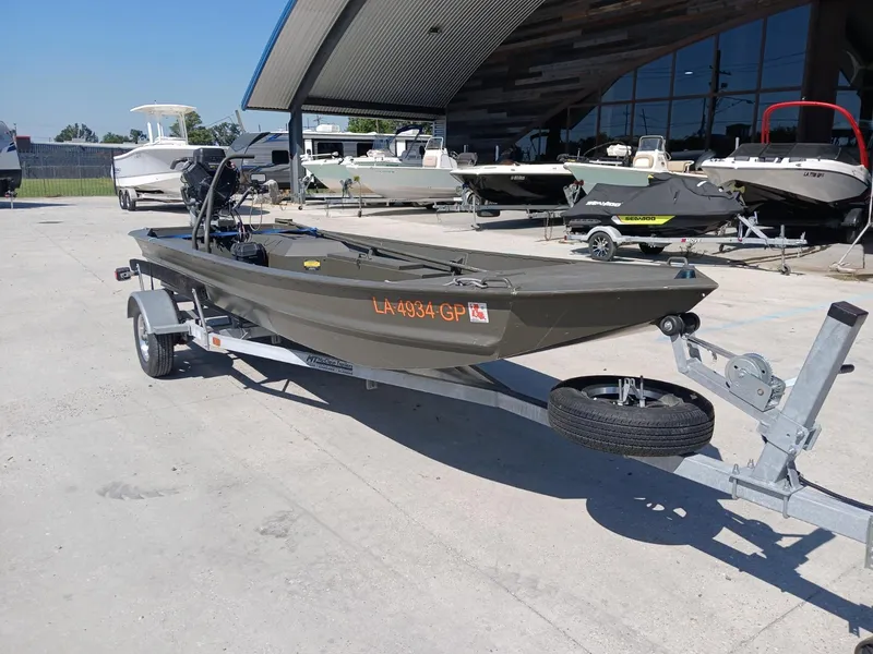 Slide: The Image of 2023 Go-Devil 18x48 boat on trailer in outdoor showroom. - 5